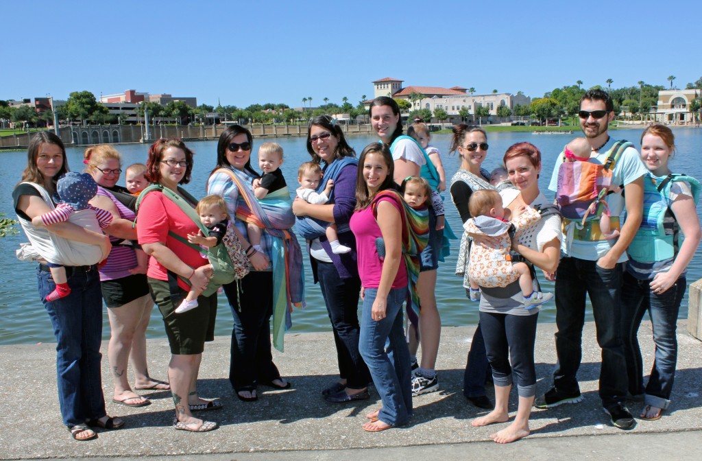 Lakeland Babywearing in front of lake. 