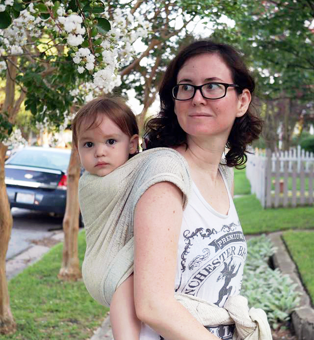Toddler Back Wrap Toddler wrapped on mom's back.