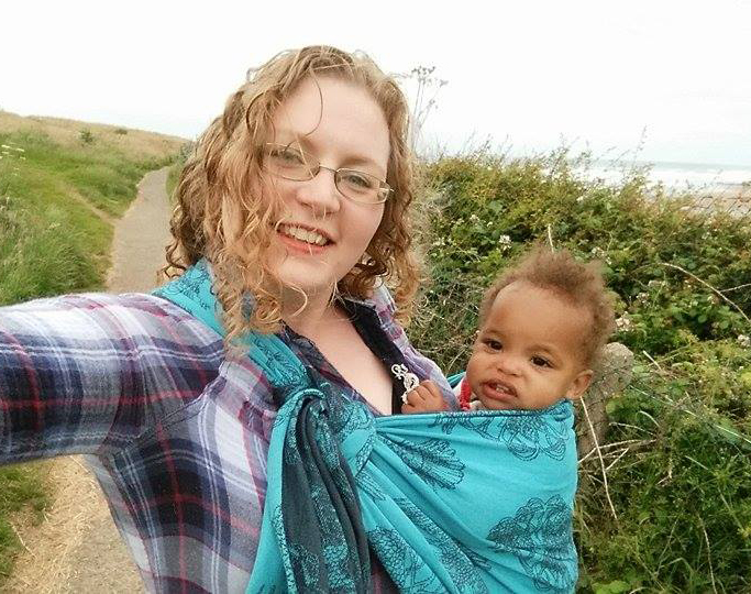 Wrapping One Twin One twin wrapped on mom for cuddles.