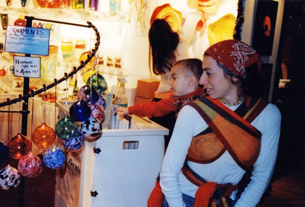 Toddler back wrapped up at the Armadillo Christmas Bazaar in Austin TX