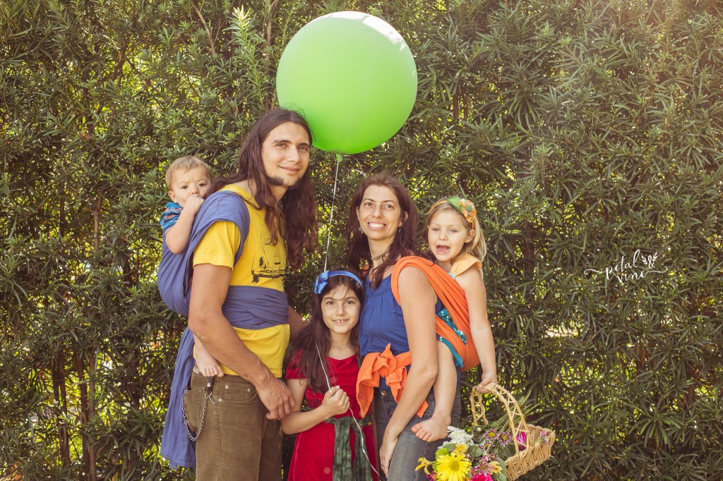 Parents and 3 kids all in woven wraps.